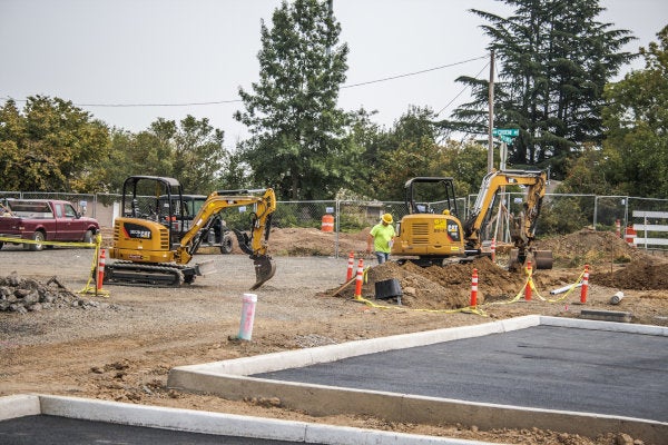 Cat Mini Excavators on a Jobsite