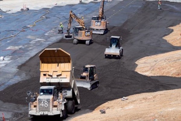 Placing RCC on emergency spillway