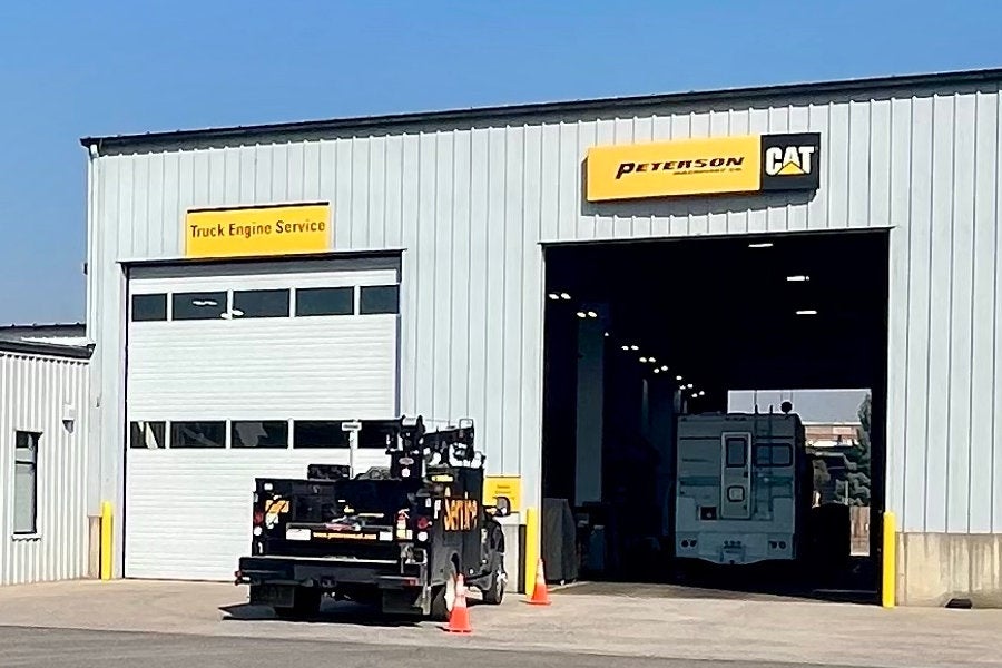 An RV being serviced in the commercial truck engine shop