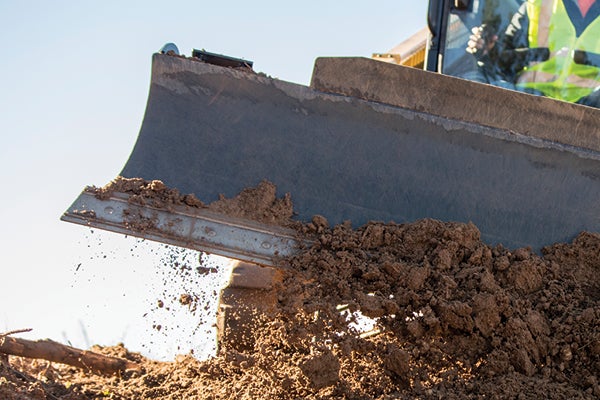 dozer blade on a cat machine