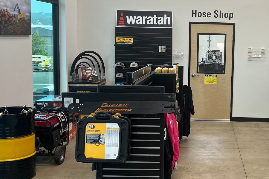 Hose shop entrance and Waratah parts display.