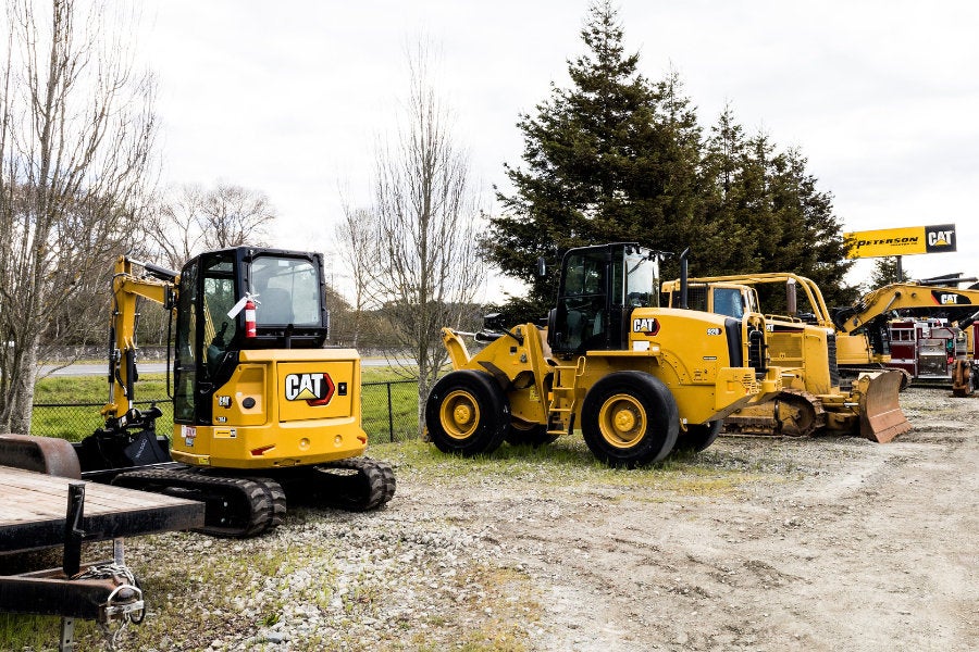 New and used equipment staged near the highway