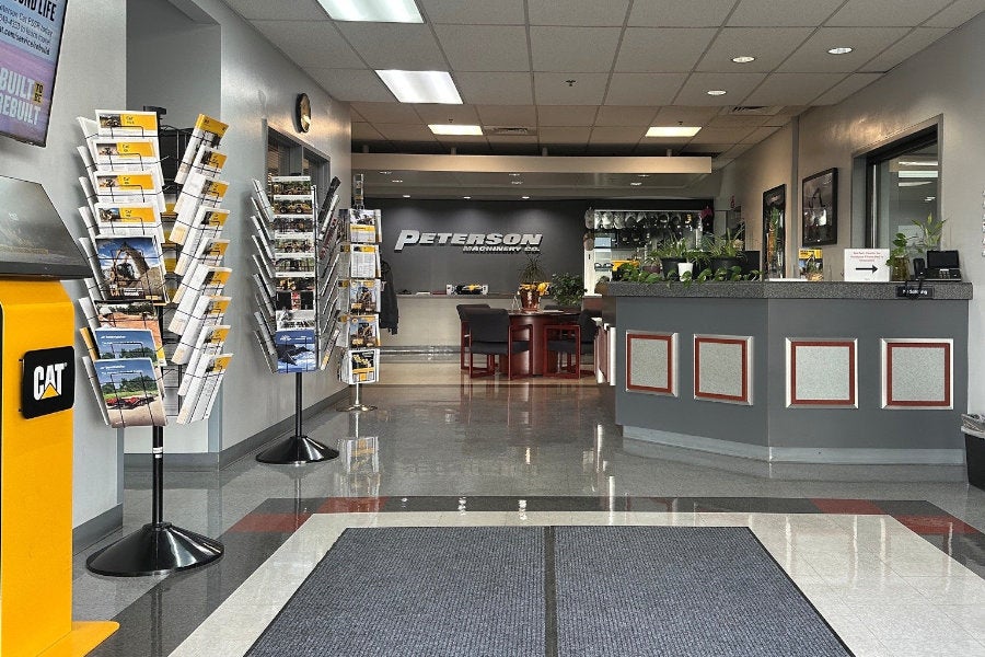 Medford lobby with printed machine specifications and an information kiosk