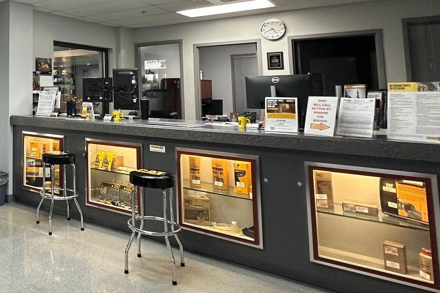 Medford parts counter with filters, oil sample kits, and tools on display