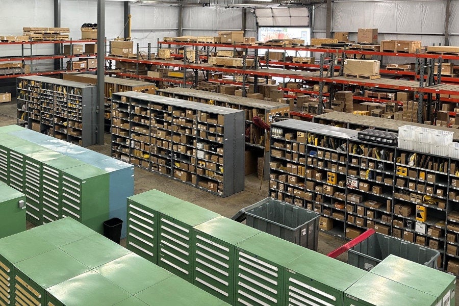 Medford parts warehouse with storage cabinets, shelving, drawers, and parts inventory