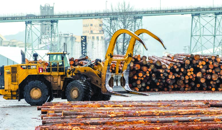 Cat wheel loader at Weyerhauser millyard in Longview, WA in 2020