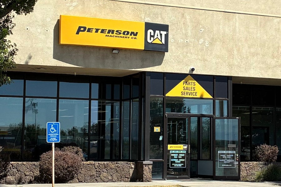 The main entrance to the Redmond store with one door braced open to invite people in