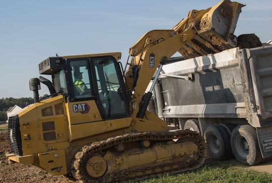 The Cat 963 crawler loader has the reach for loading trucks