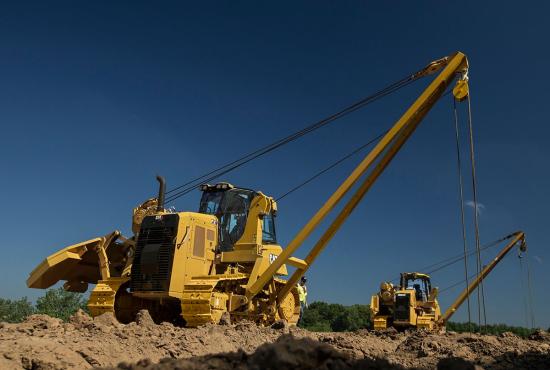 Two PL61 Pipelayers laying pipe