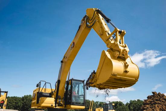 320 Hydraulic Excavator digging a trench