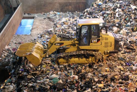 963K Waste Handling Track Loader working in a transfer station