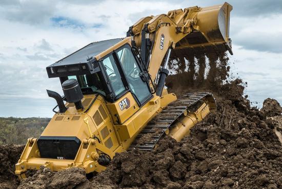 973K Track Loader pushing dirt into a pile