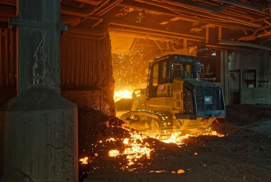 973K Track Loader equipped with a Steel Mill package goes in to the slag furnace