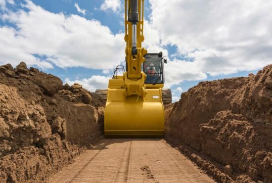 323 Hydraulic Excavator digging to grade