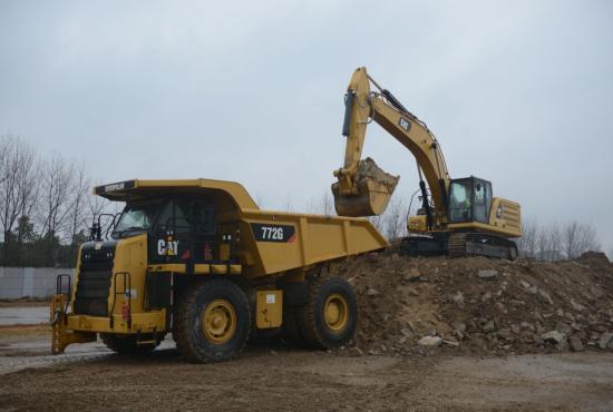 The 336 GC and Cat 772 truck work well together.