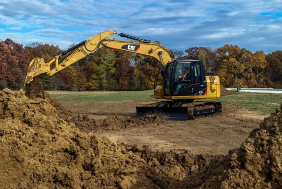 311F L RR Hydraulic Excavator digging