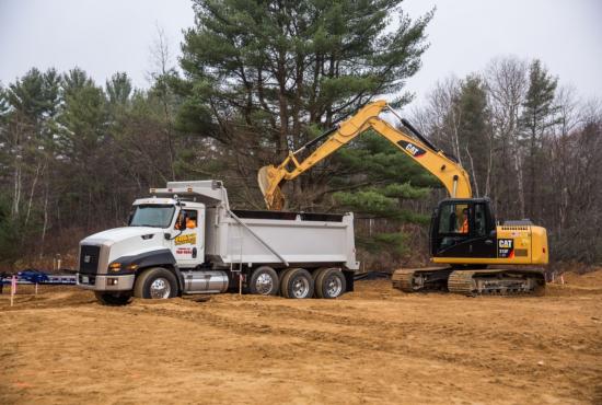 313F GC Hydraulic Excavator truck loading