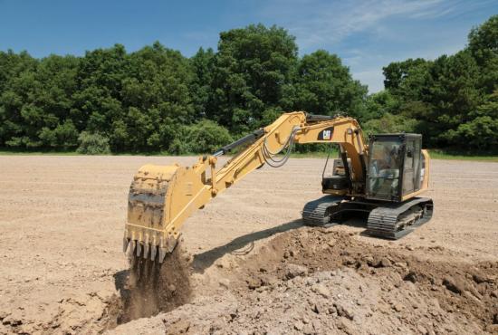 313F Hydraulic Excavator emptying bucket