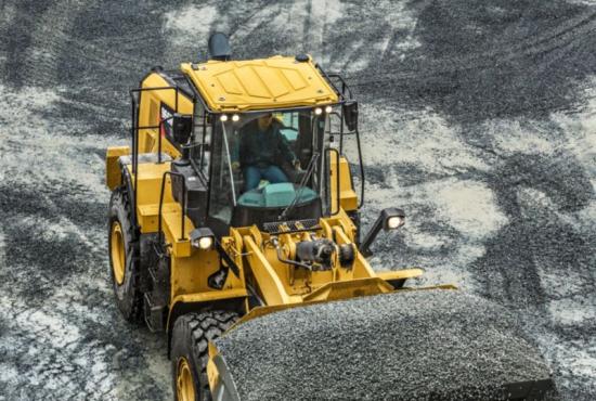 966M Medium Wheel Loader Moving Rock