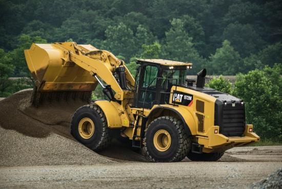 972M Medium Wheel Loader Dumping Rock