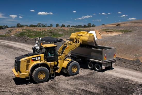 980M Medium Wheel Loader Loading a Truck