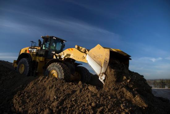 980M Medium Wheel Loader Moving Dirt