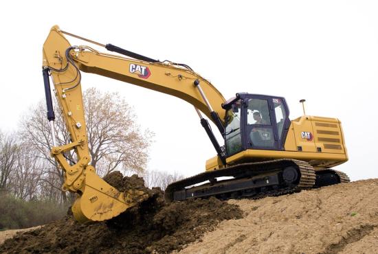 326 Track Excavator digging on hillside