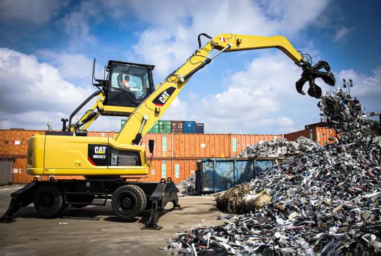 MH3022 Wheel Material Handler Working at a Scrap Metal Recycling Operation