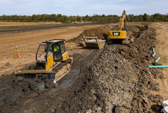 D4 dozer finishing trench backfill