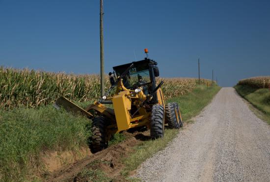 Ditch cleaning using the 140 GC grader