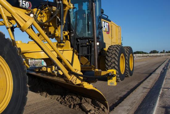 150 Motor Grader fine grading by curb