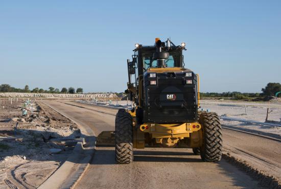 160 Motor Grader building road with curb