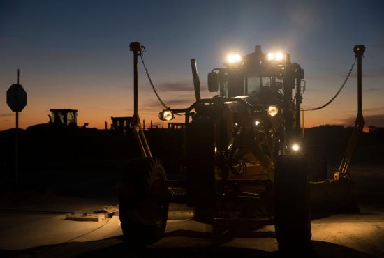 140 Motor Grader with bright headlights