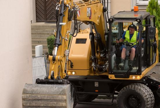 M314 Wheeled Excavator backfilling