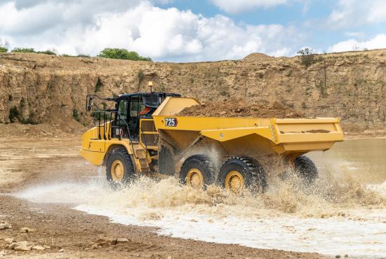 725 Dump Truck Driving through Mud