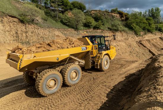 725 Articulated Truck Hauling Dirt