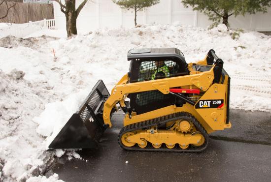 Skid Steer Loader Material Handling Bucket - Pushing Snow in New York Skid Steer Loader Material Handling Bucket - Pushing Snow in New York