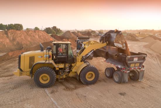 966 GC Medium Wheel Loader Loading a Truck