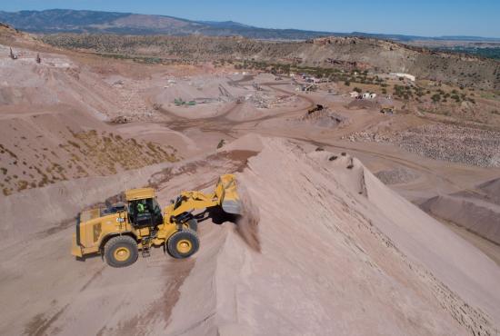 966 GC Medium Wheel Loader Scooping Dirt