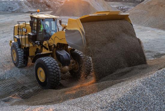 980 GC Wheel Loader sunset view while stockpiling