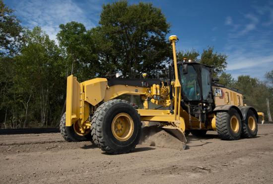 14 Motor Grader pushing gravel