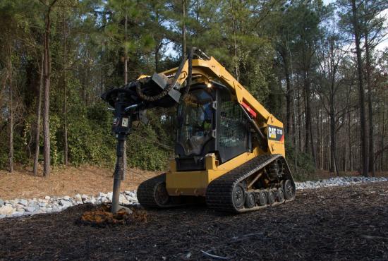 Cat® Auger at Work on a 277D Multi Terrain Loader