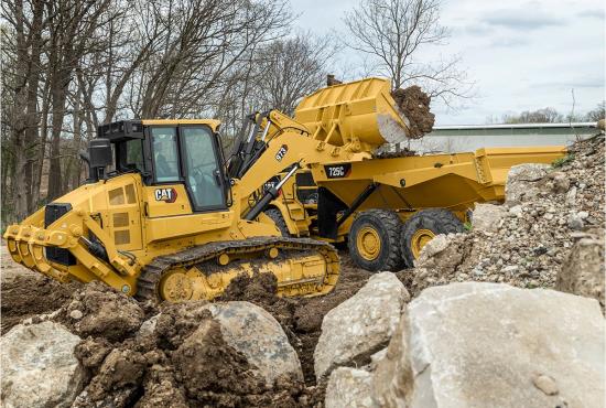 The 973 crawler loader is powerful enough for heavy truck loading