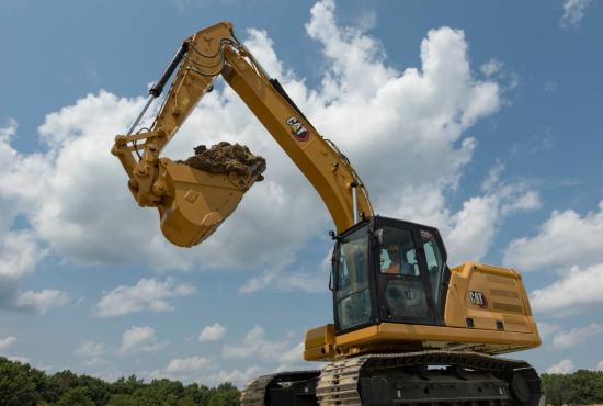 320 GC Excavator with a full bucket