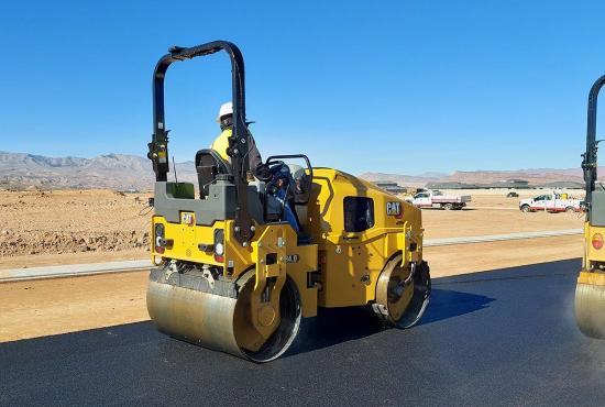 CB4.0 tandem roller compacting asphalt on a road