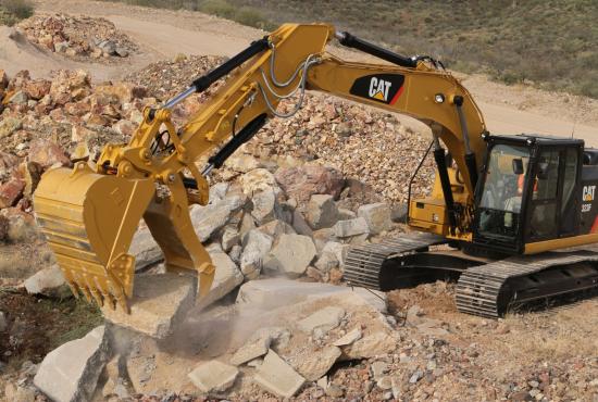 Ditch cleaning with coupler and clean-up bucket.