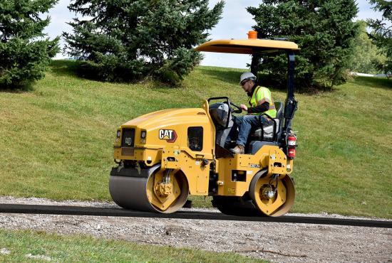 CB2.7 GC tandem roller compacting asphalt on a footpath