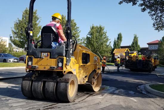 CC2.7 combination tandem roller compacting asphalt in a parking lot.