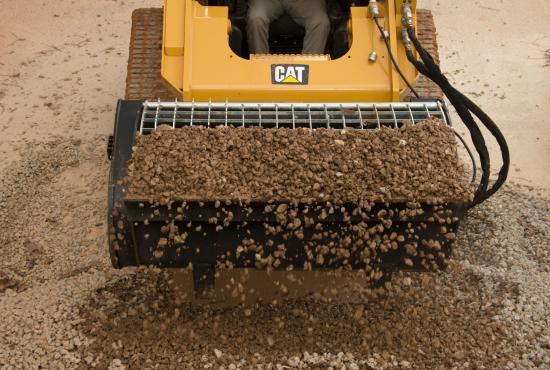 Cat® Mixing Bucket Scooping Rock