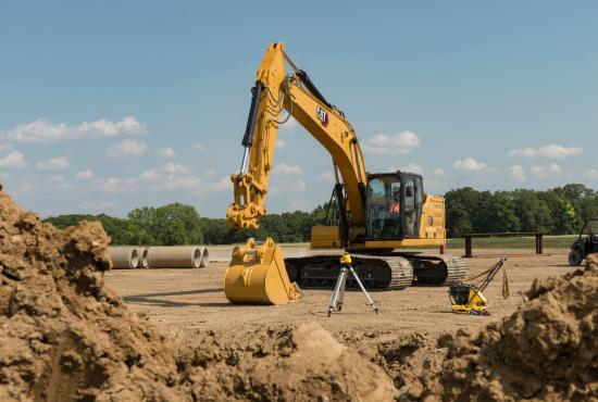 320 GC Excavator switching to a bucket attachment